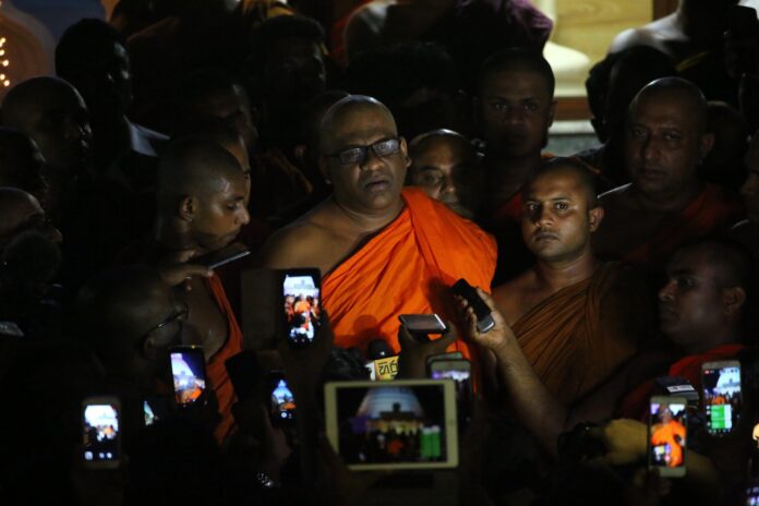 Colombo, Sri Lanka. 23rd May, 2019. Sri Lankan General Secretary of the Bodu Bala Sena (BBS) Ven. Galagodaatte Gnanasara (C) speaks to the media at the Rukmalgama Temple in Rukmalgama Near the Colombo on May 23, 2019. A firebrand Sri Lankan Buddhist monk